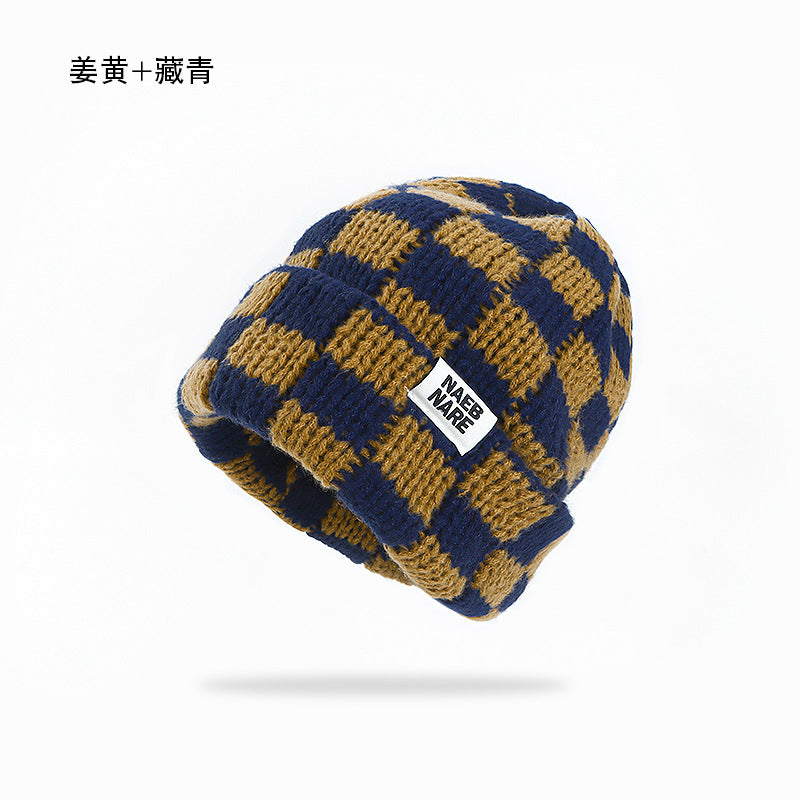 Wholesale Checkerboard plaid knitted hat women' s autumn and winter face-revealing small warm hat
